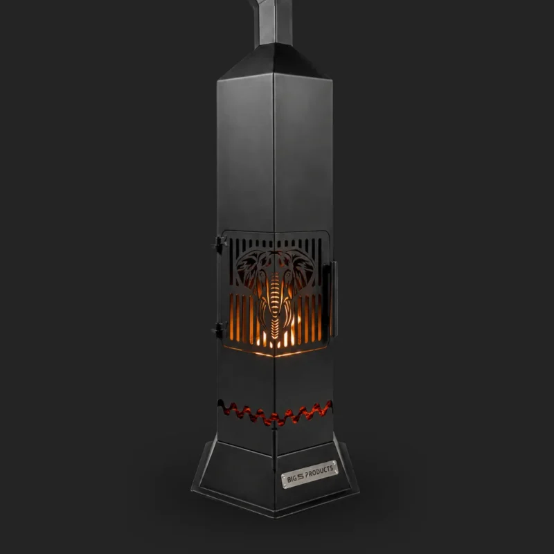Tembo fireplace lit with flame glowing through elephant cutout
